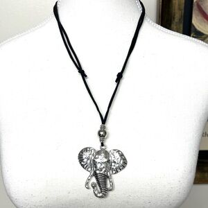 Elephant head necklace, suede slip knot cord, NIP, head only 2” x2”